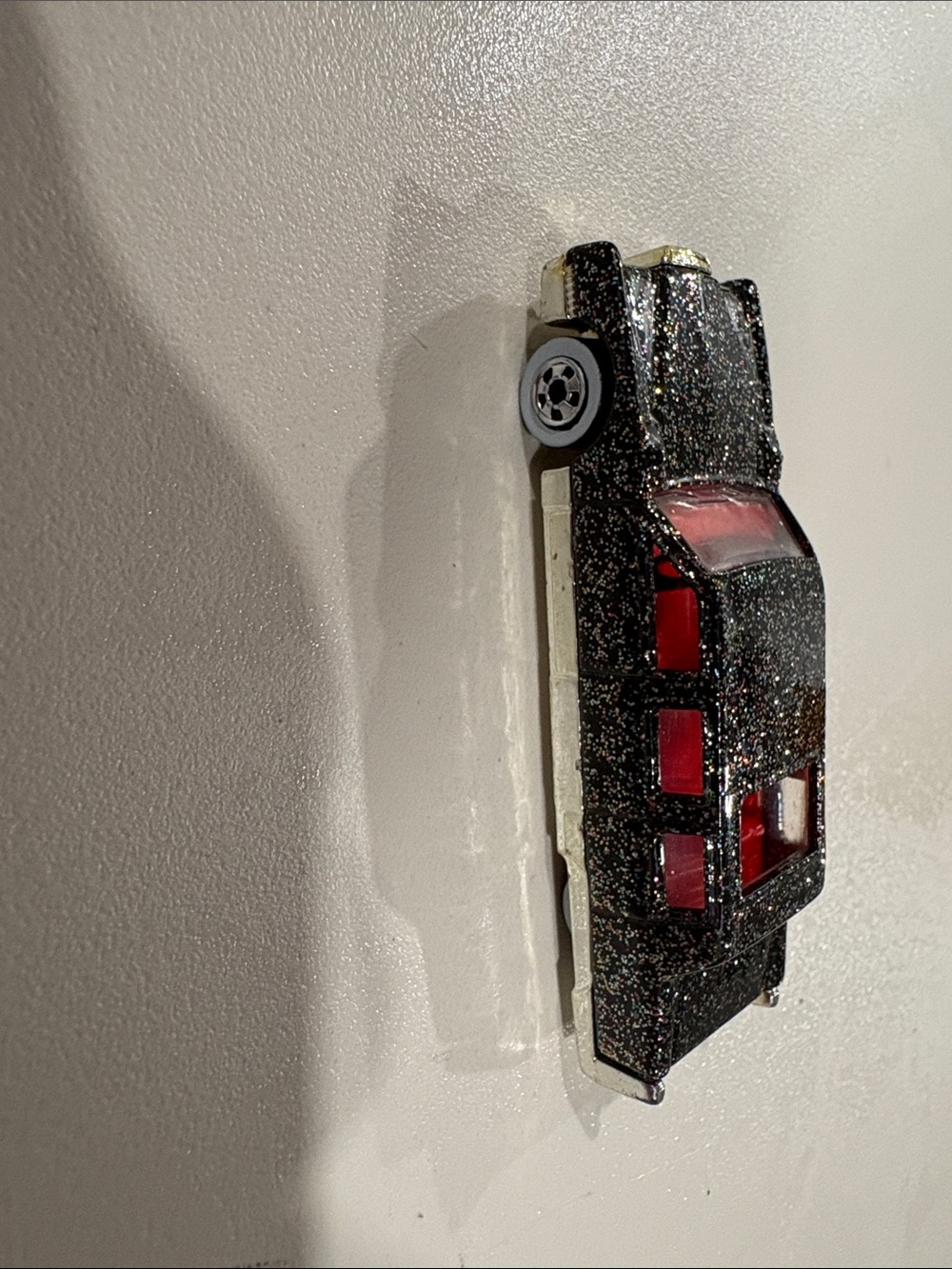 1990 Hot Wheels Cadillac Limousine with black glitter paint